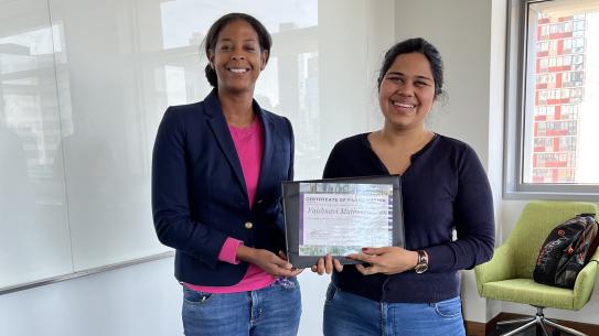 Director of Academic Affairs, CUSP and student holding certificate
