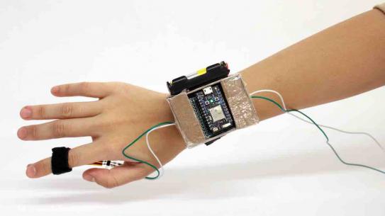 digital device attached to wrist