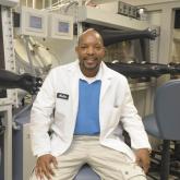 Andre Taylor wearing lab coat in Clean lab